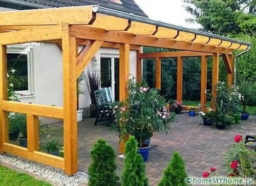 Крепление козырька к кирпичной стене. Крепление навеса к кирпичной стене