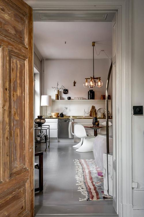 Золотые детали в интерьере скандинавской квартиры (87 кв. м) 10