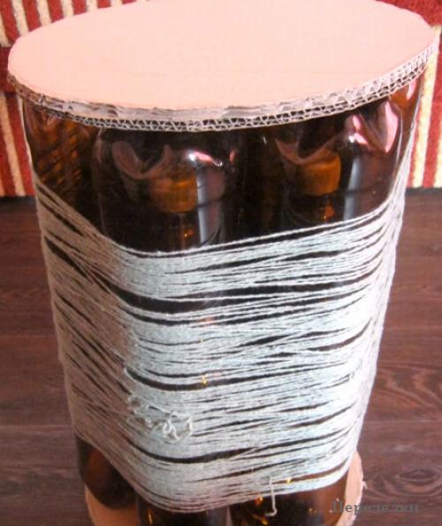 Пуфик из пластиковых бутылок. Пластиковык бутылки в ход. Интересный вариант использоваания.