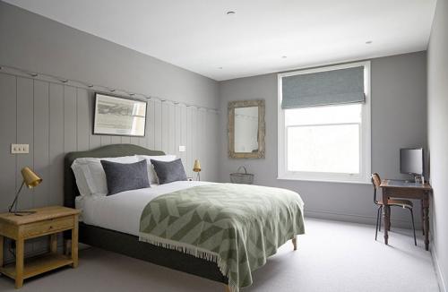 Дом со спокойным интерьером и уютным двориком 15