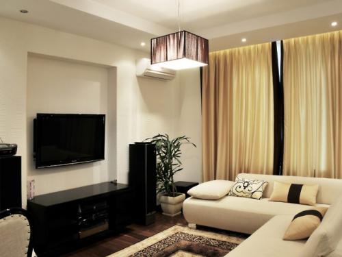 Интерьер маленькой комнаты с диваном. Стили интерьера для маленькой гостиной