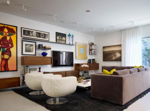 Как встроить телевизор в стену. Варианты оформления стены под телевизор в гостиной