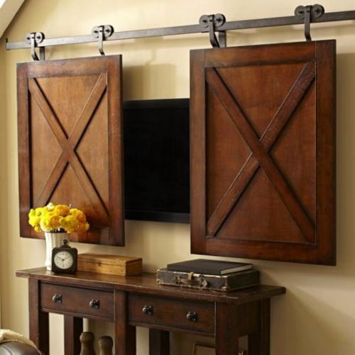 Как спрятать телевизор в интерьере?