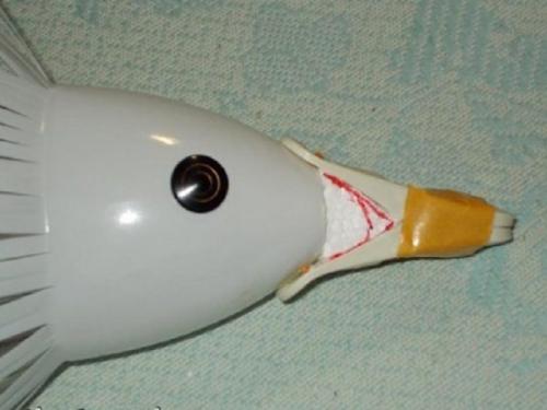 Лебедь из пластиковых бутылок. Лебедь кашпо из бутылок 01