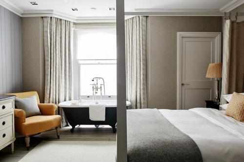 Атмосфера загородного дома в таунхаусе 10