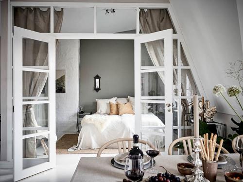 Мансардная квартира с великолепными арочными окнами (86 кв. м) 10