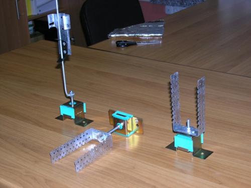 Крепление профиля к потолку. Виброизолирующие подвесы