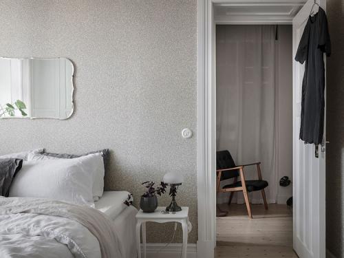 Белоснежная квартира с тёплыми акцентами 17