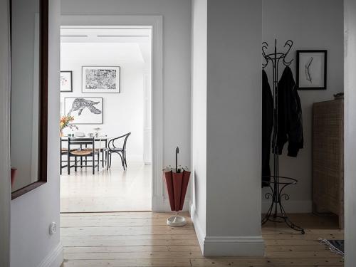 Белоснежная квартира с тёплыми акцентами 24