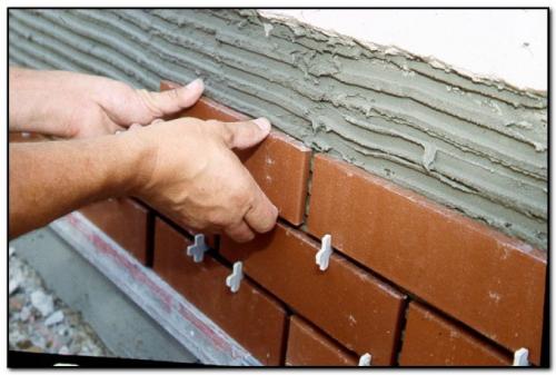 Чем обшить стены дома из пеноблока. Плитка