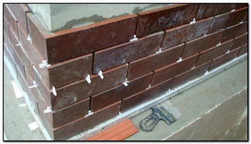 Чем отделать снаружи дом из пеноблоков. Плитка