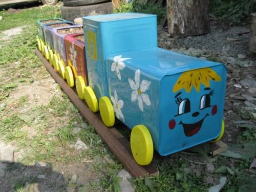 Что можно сделать из старой канистры. Вазон «Веселый поезд»