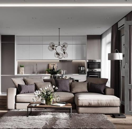 Красивый интерьер просторной кухни - гостиной. 02