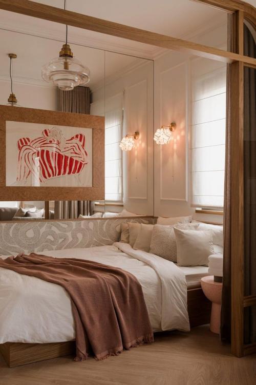 Интерьер этой небольшой квартиры - наглядный пример того, как даже в ограниченном пространстве можно создать атмосферу уюта и эстетики. 07