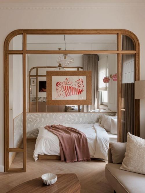 Интерьер этой небольшой квартиры - наглядный пример того, как даже в ограниченном пространстве можно создать атмосферу уюта и эстетики. 02