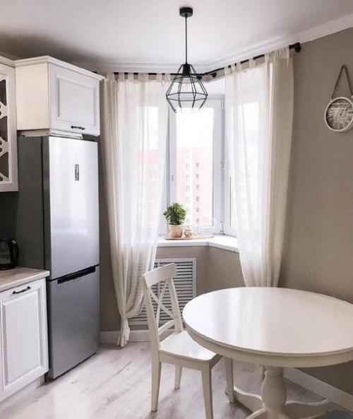 Интересный пример ремонта в кухне с эркерлм.