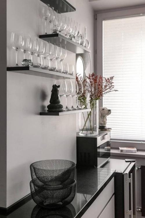 Строгий стиль интерьера с преобладанием серых и черных оттенков. 08