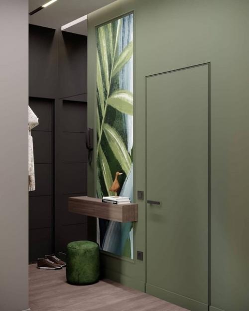 Стильный вариант обустройства прихожей в темной цветовой гамме. 04