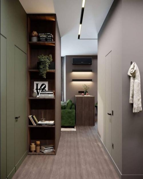 Стильный вариант обустройства прихожей в темной цветовой гамме. 01