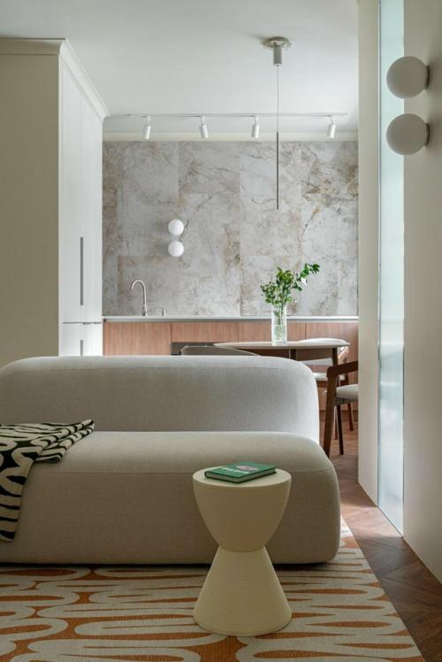 Марьям и Антон Разуваевы создали спокойный, минималистичный интерьер, который остаётся визуально интересным и функциональным. 03