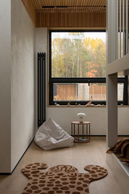 Современный загородный дом в природном стиле - отличный пример того, как архитектура и интерьер могут соединяться с окружающей средой. 05