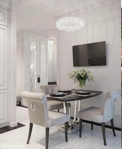 Просторная и светлая кухня выглядит очень привлекательно. 04