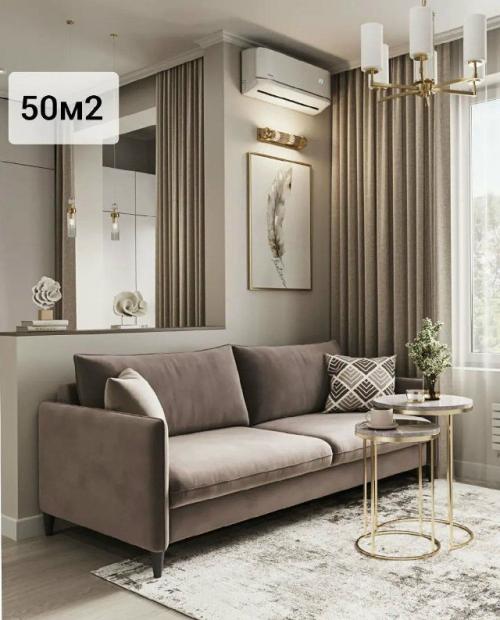 Квартира - студия, в которой кухня, гостиная и лоджия образуют просторное единое пространство. 01