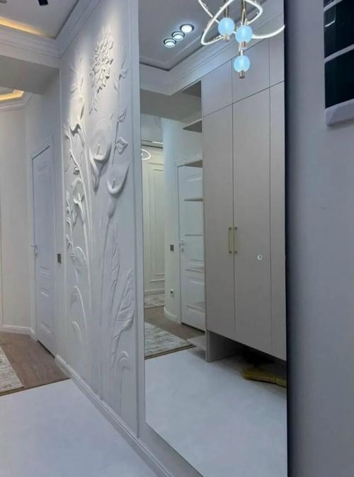Квартира с тремя комнатами, выполненная в стиле современного дизайна. 05