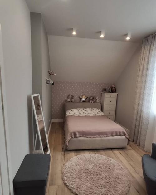 Интерьер детской комнаты на мансардном этаже. 02