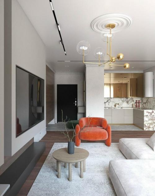 Интерьер небольшой кухни - гостиной выполнен в стильном современном стиле. 01