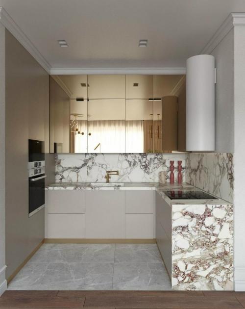 Интерьер небольшой кухни - гостиной выполнен в стильном современном стиле. 03