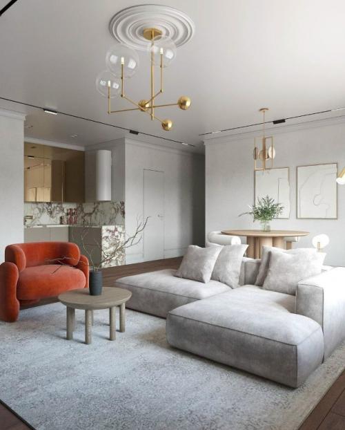 Интерьер небольшой кухни - гостиной выполнен в стильном современном стиле. 

