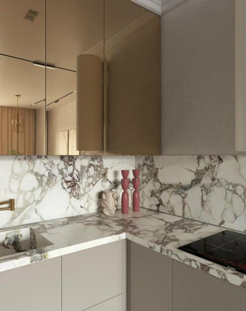 Интерьер небольшой кухни - гостиной выполнен в стильном современном стиле. 05