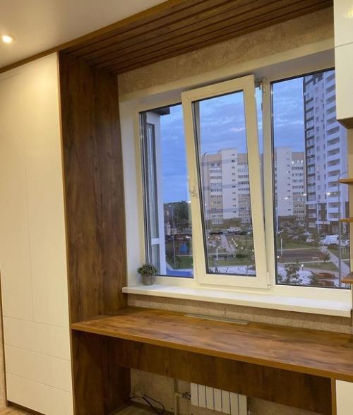 Очень понравилась идея с установкой шкафов у окна. 06