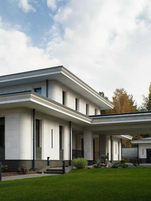 Яркая живопись, ковры и этнические мотивы - необычный и тёплый офис в Уфе. 01